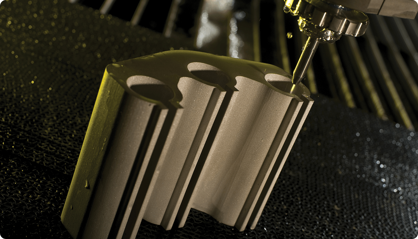 A thick intricate part being cut with a waterjet
